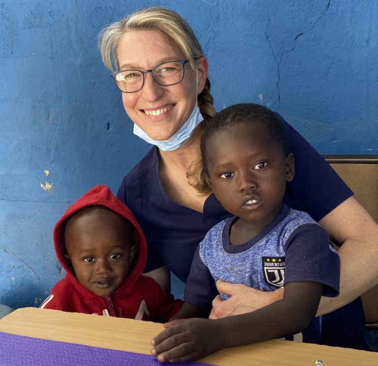 Dr. Pilar Buerk with Gambian Patients