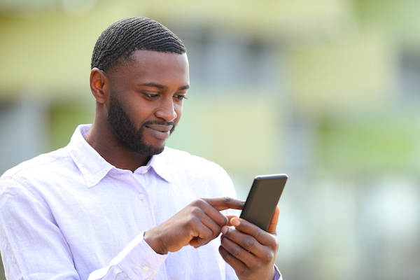 parent looking at apps on phone