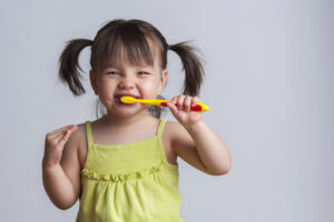 oral health care small child brushing teeth